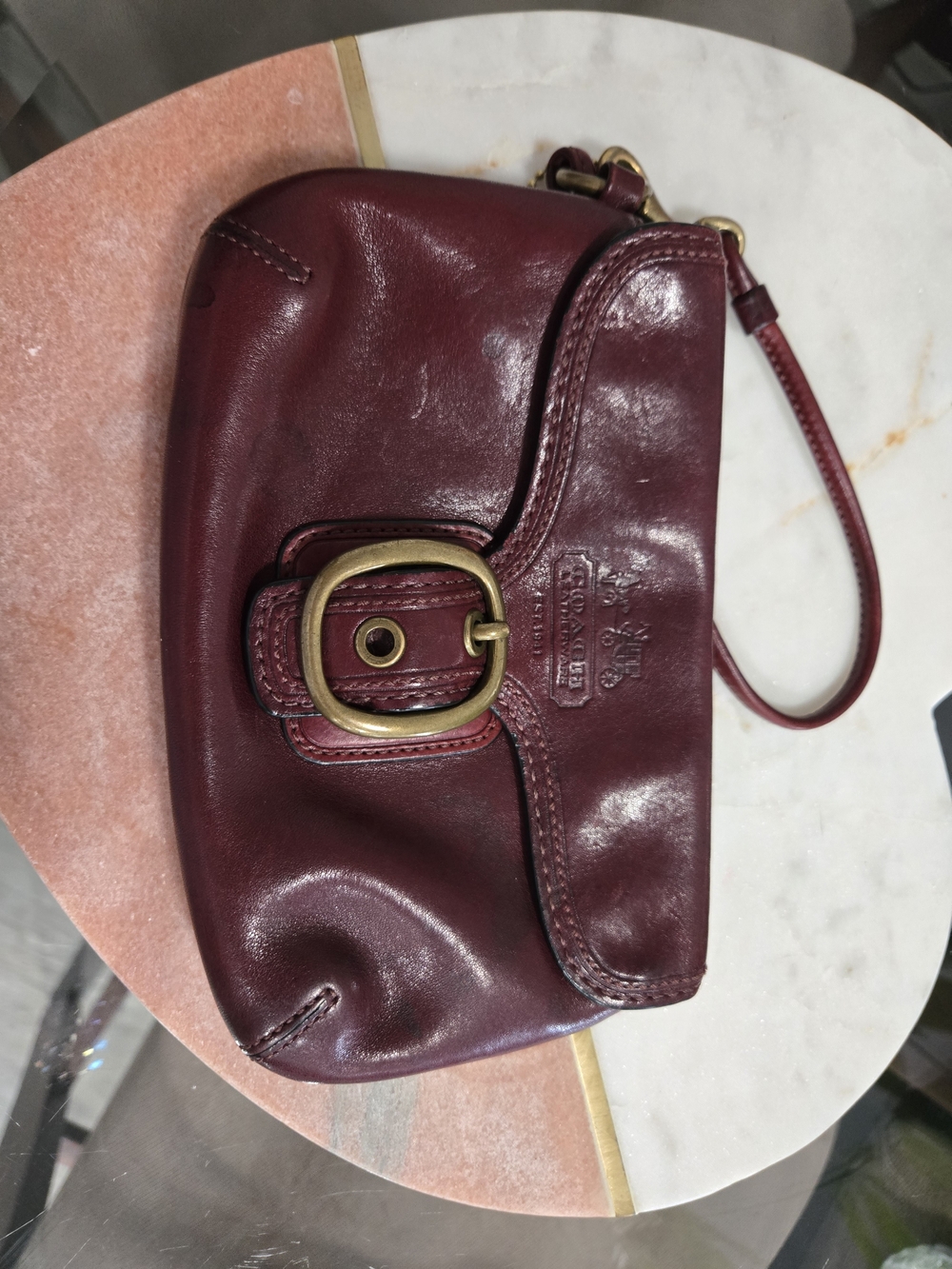 Y2K-era vintage Coach Bleecker Buckle Flap Leather Wristlet in a deep wine